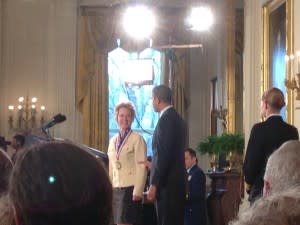 Frances Arnold receives her medal from President Obama. Credit: Mariette DiChristina