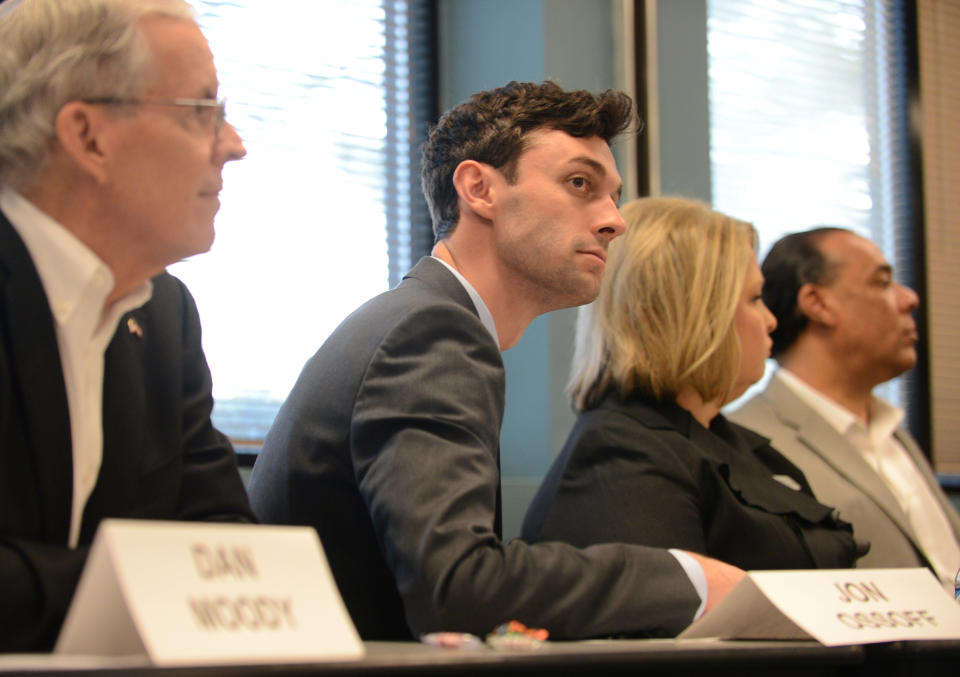 Democrat Jon Ossoff listens to other candidates speak during the League of Women Voters' candidate forum for Georgia's 6th Congressional District special election to replace Tom Price, who is now the secretary of Health and Human Services, in Marietta, Georgia, U.S. April 3, 2017. Picture taken April 3, 2017. REUTERS/Bita Honarvar