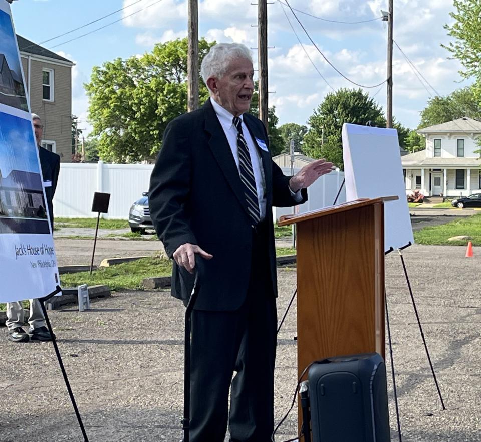 Jack Ream, who started the shelter operated by Friends of the Homeless of Tuscarawas County in 2005, speaks during a groundbreaking ceremony Thursday for a new shelter.