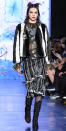 <p>The runway rockstar wore a <em>very </em>different look than she did at Ralph Lauren with bold shadow, a red lip, and graphic prints for Anna Sui.</p>