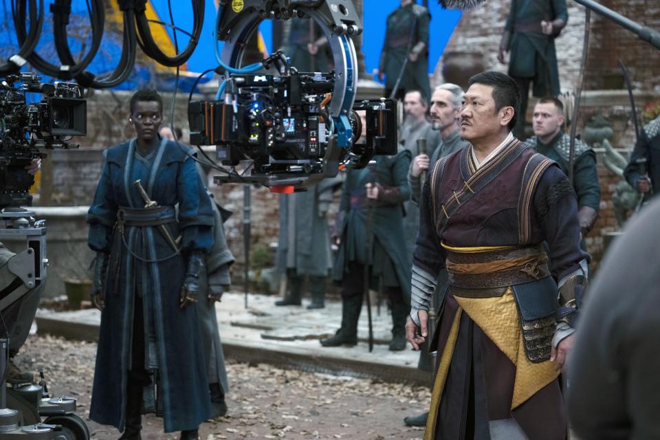 Sheila Atim and Benedict Wong on set