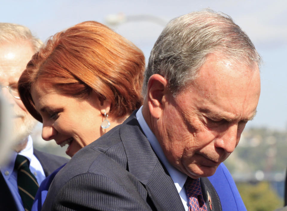 In this Sept. 20, 2012, photo, New York Mayor Michael Bloomberg, right, and City Council Speaker Christine Quinn participate in a ceremony in New York. Quinn is one of several possible candidates to run for mayor in 2013. Some of the city's top political players are already jockeying for position, preparing to introduce themselves to voters who haven't paid much attention to who will succeed Michael Bloomberg, the billionaire mayor who has defined City Hall for more than a decade. (AP Photo/Mark Lennihan)