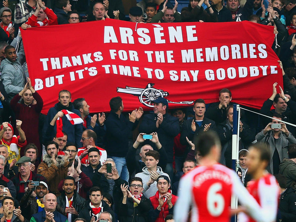 Arsenal supporters unfurl a banner in protest against Wenger's management during the 2015/16 season: Getty