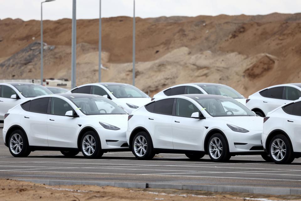 Tesla Model Y electric vehicles in a lot at the Tesla Inc. Gigafactory in Gruenheide, Germany, on Saturday, Jan. 21, 2023.  / Credit: Liesa Johannssen/Bloomberg via Getty Images