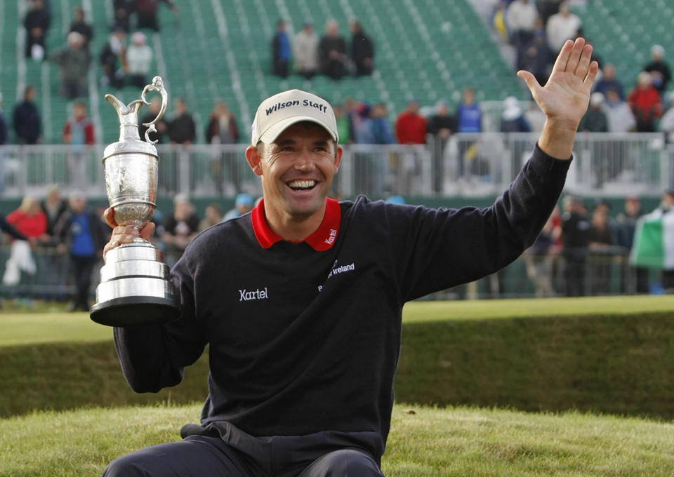 FILE - Ireland's Padraig Harrington holds the trophy after winning the British Open Golf Championship at Carnoustie, Scotland, July 22, 2007. Harrington is to be inducted into the World Golf Hall of Fame, Monday, June 10, 2024, in Pinehurst, N.C. (AP Photo/Matt Dunham, File)