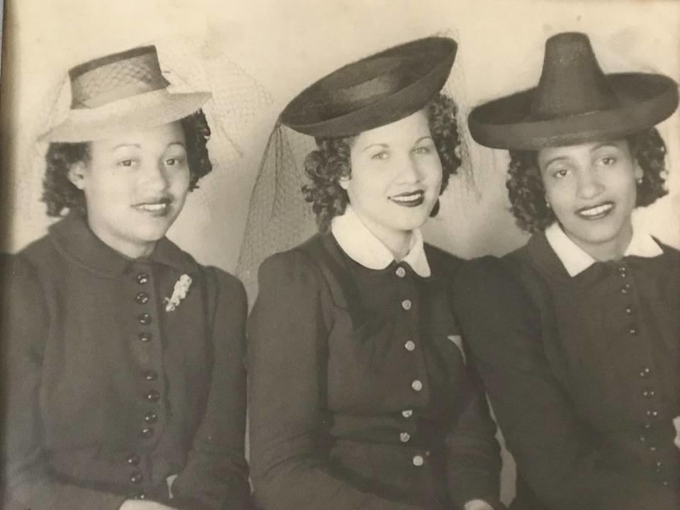 Lillie Williams (right) with her sister Ozell Yates (left) in a newspaper clipping describing them as two of the most popular young debutantes in Kansas City.