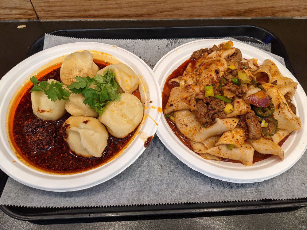 Spicy & sour pork and cabbage dumplings, Spicy cumin lamb hand pulled noodles at Xi'an Famous Foods