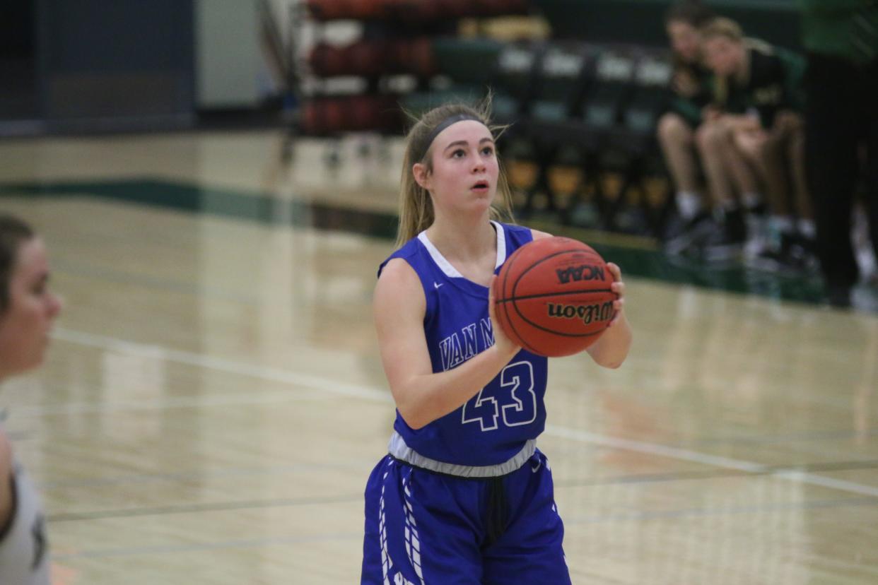 Van Meter's Finley Netten lines up her shot at the free-throw line during a game against Woodward-Granger on Friday, Feb. 4 in Woodward.