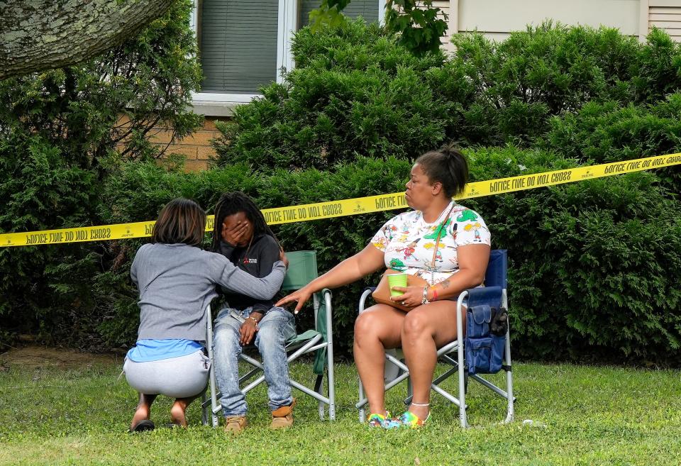 Family and friends comfort each other after a 7-year-old boy died in an accidental shooting inside a home on the 9700 block of Arvin Avenue in Springfield Township on Tuesday, July 16, 2024