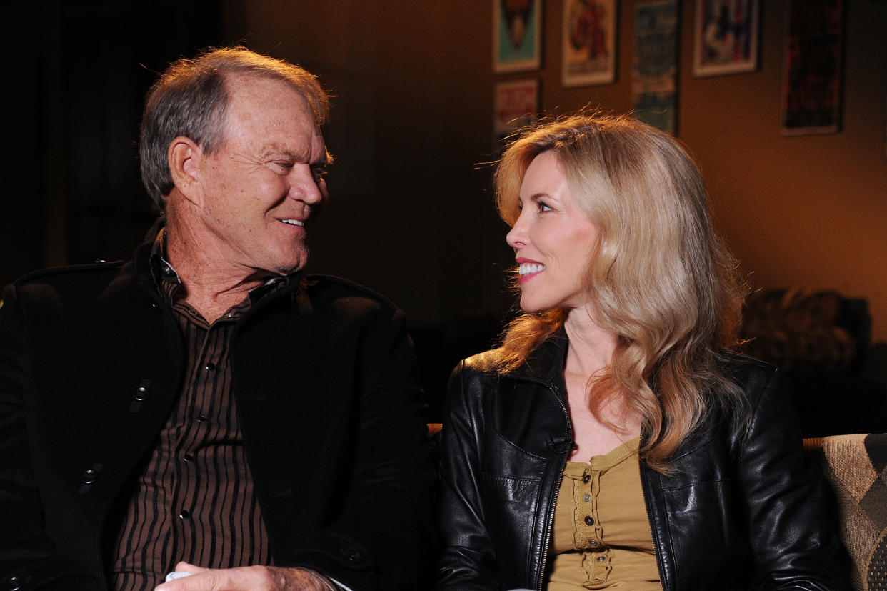 <span>Glen Campbell and Kimberly Campbell at the Bridgestone Arena in Nashville, Tenn., on Sept. 19, 2011. (Photo: Rick Diamond/Getty Images North America) </span>