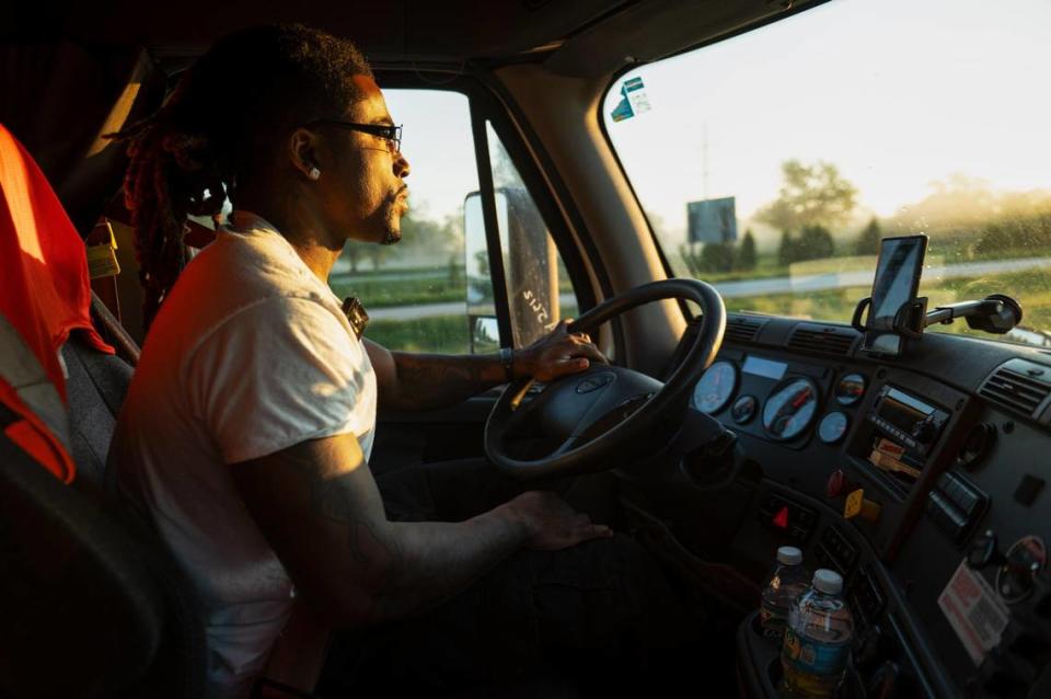 John Roddy drives his semi-trailer truck for an early morning delivery in Kansas City. Zachary Linhares/The Kansas City Star