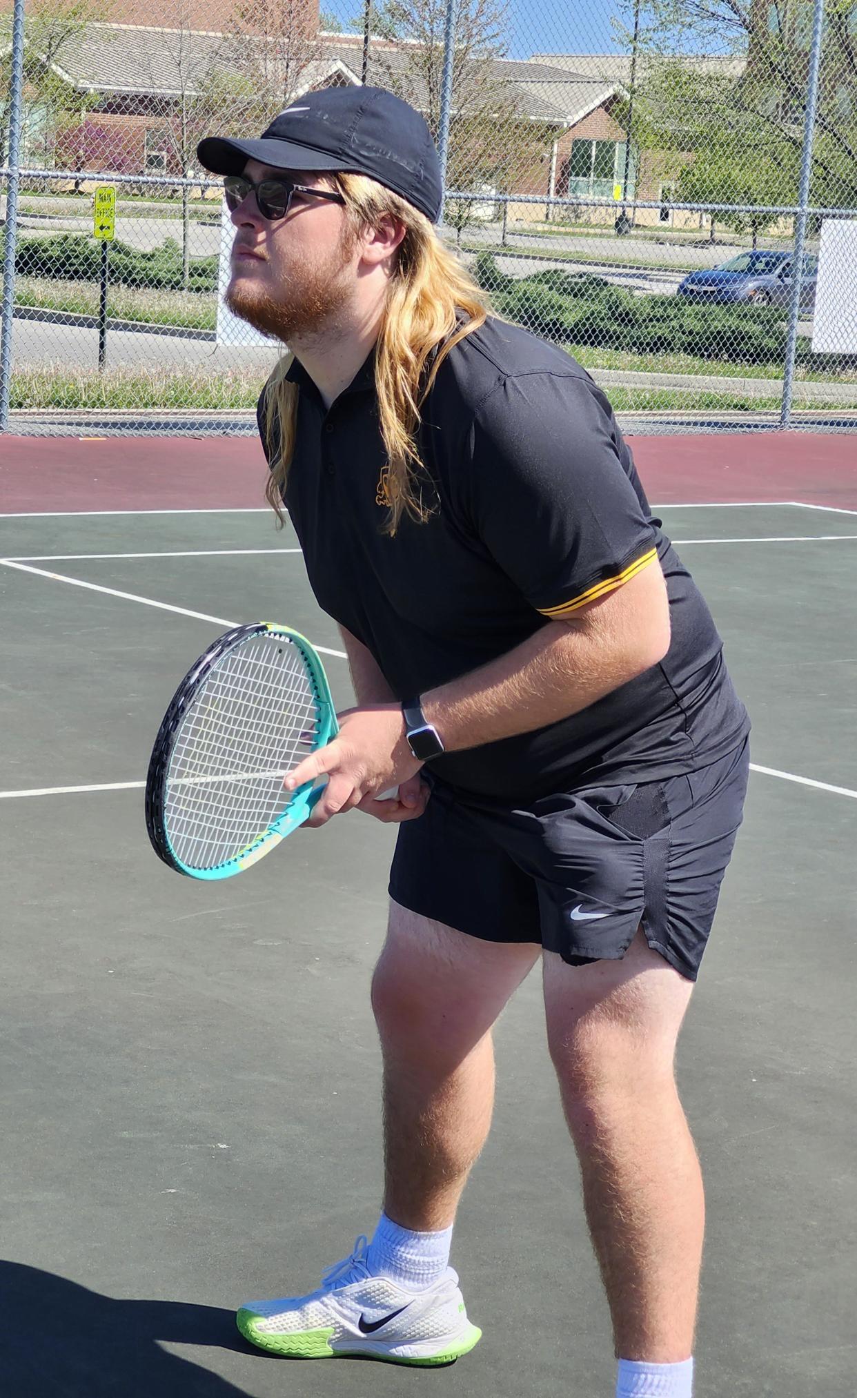 Montana Runser, shown here warming up before a match Monday against Grove City, is one of several seniors leading Franklin Heights' quest for a second consecutive winning season and only its second this century.