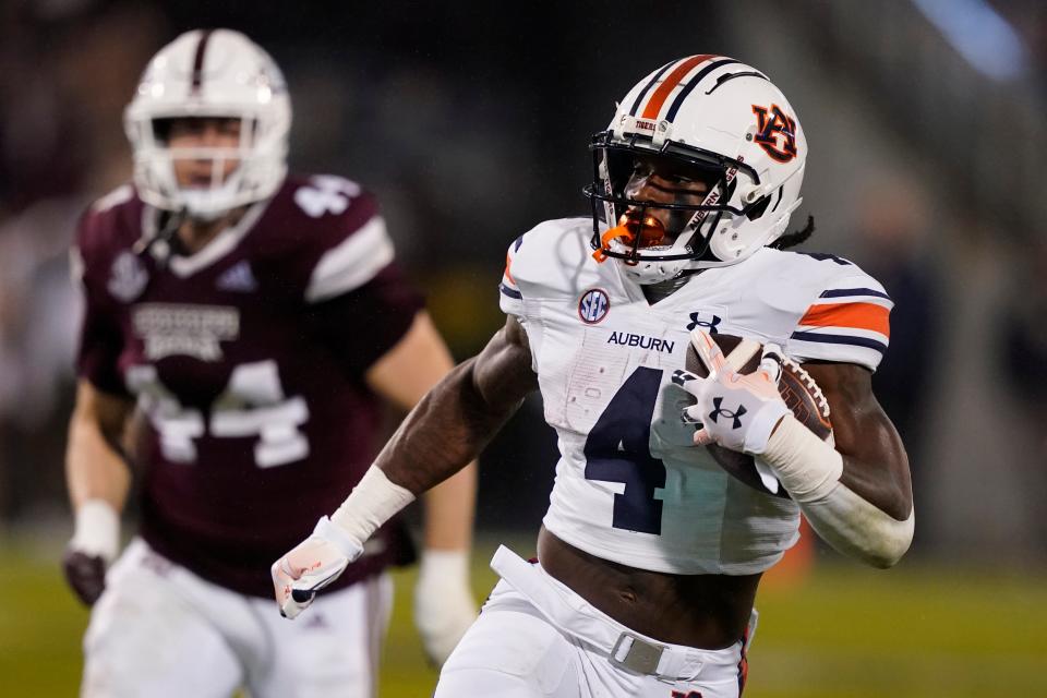 Auburn running back Tank Bigsby finds running room during Saturday's loss at Mississippi State.