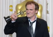 Quentin Tarantino holds the trophy for Best Original Screenplay in the press room during the Oscars on February 24, 2013 in Hollywood, California