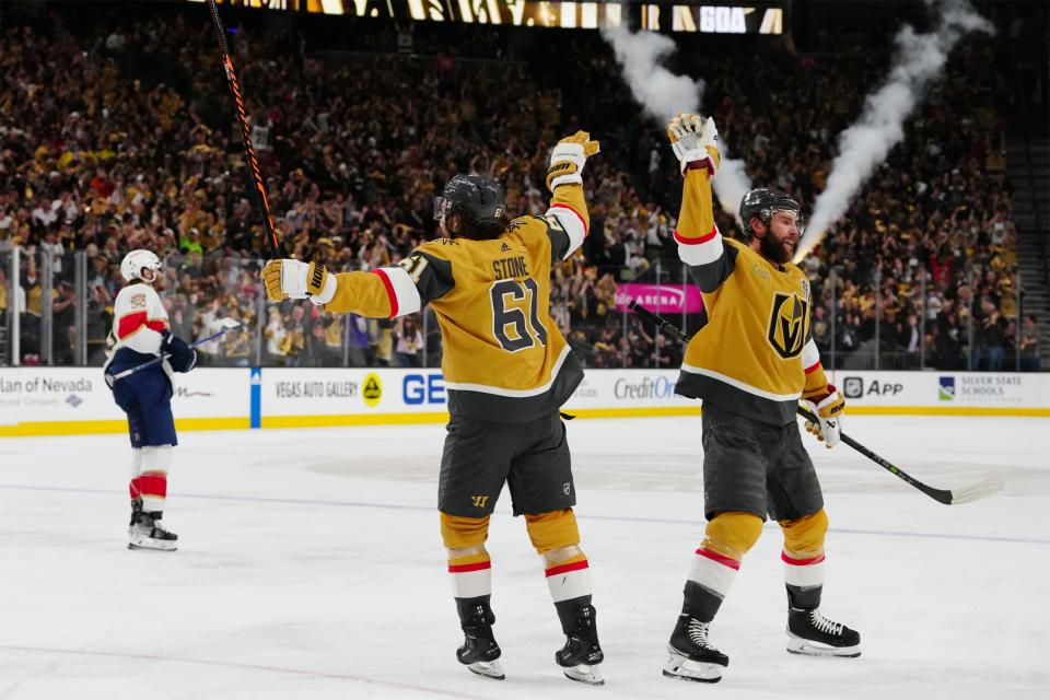 Game 2: Vegas Golden Knights right wing Mark Stone (61) and center Nicolas Roy (10) celebrate a goal in the second period against the Florida Panthers.  Vegas won 7-2.