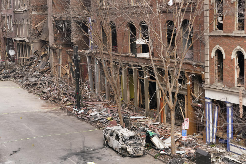 A vehicle destroyed in a Christmas Day explosion remains on the street Tuesday in Nashville. A motive for the attack has remained elusive. (Photo: ASSOCIATED PRESS)