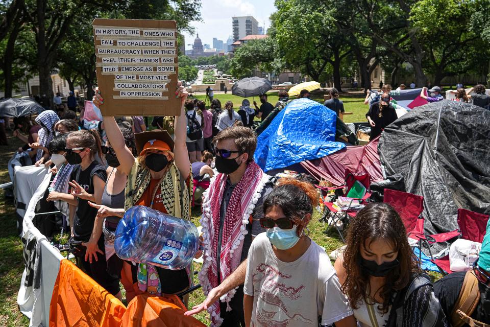 Protesters set up a tent camp on the UT campus Monday. Officers dismantled the camp and arrested dozens of protesters.