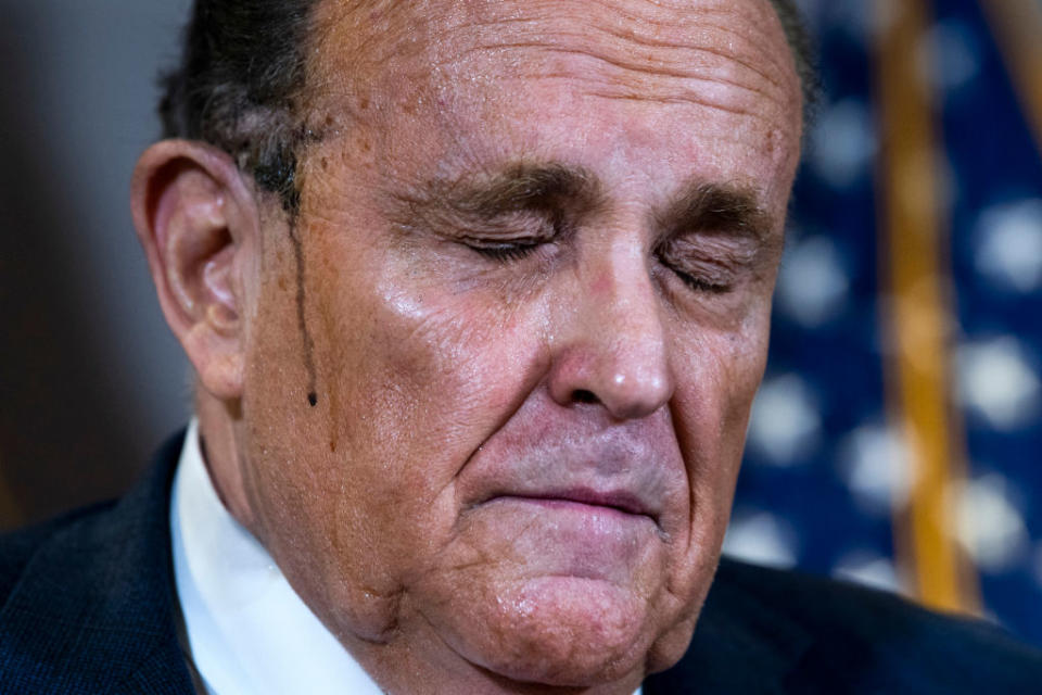 Rudolph Giuliani, attorney for President Donald Trump, conducts a news conference at the Republican National Committee on lawsuits regarding the outcome of the 2020 presidential election.
