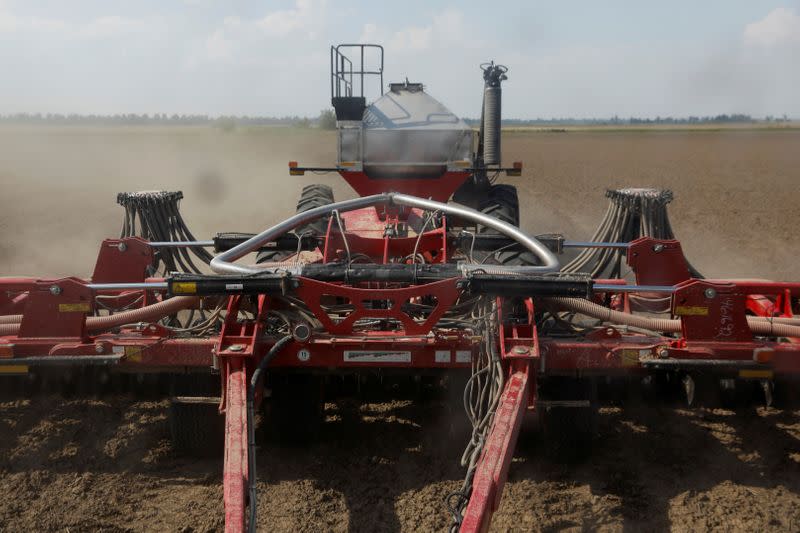 FILE PHOTO: A fertilising mechanism fertilises soybean fields in Gideon, Missouri