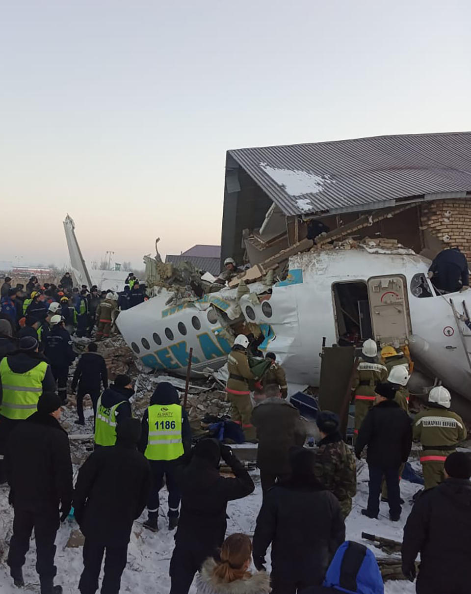 ALMATY, KAZAKHSTAN - DECEMBER 27, 2019: The site of a crash of a Bek Air plane carrying 95 passengers and 5 crew members near Almaty Airport. A Bek Air Fokker 100 passenger plane flying from Almaty to Nur-Sultan has crashed minutes after takeoff, broken through a concrete guardrail and clashed into a two-storey building. The accident has killed at least 14 people, dozens have been injured. The Press Office of the Committee for Emergency Situations of the Kazakhstan Interior Ministry/TASS (Photo by TASS\TASS via Getty Images)