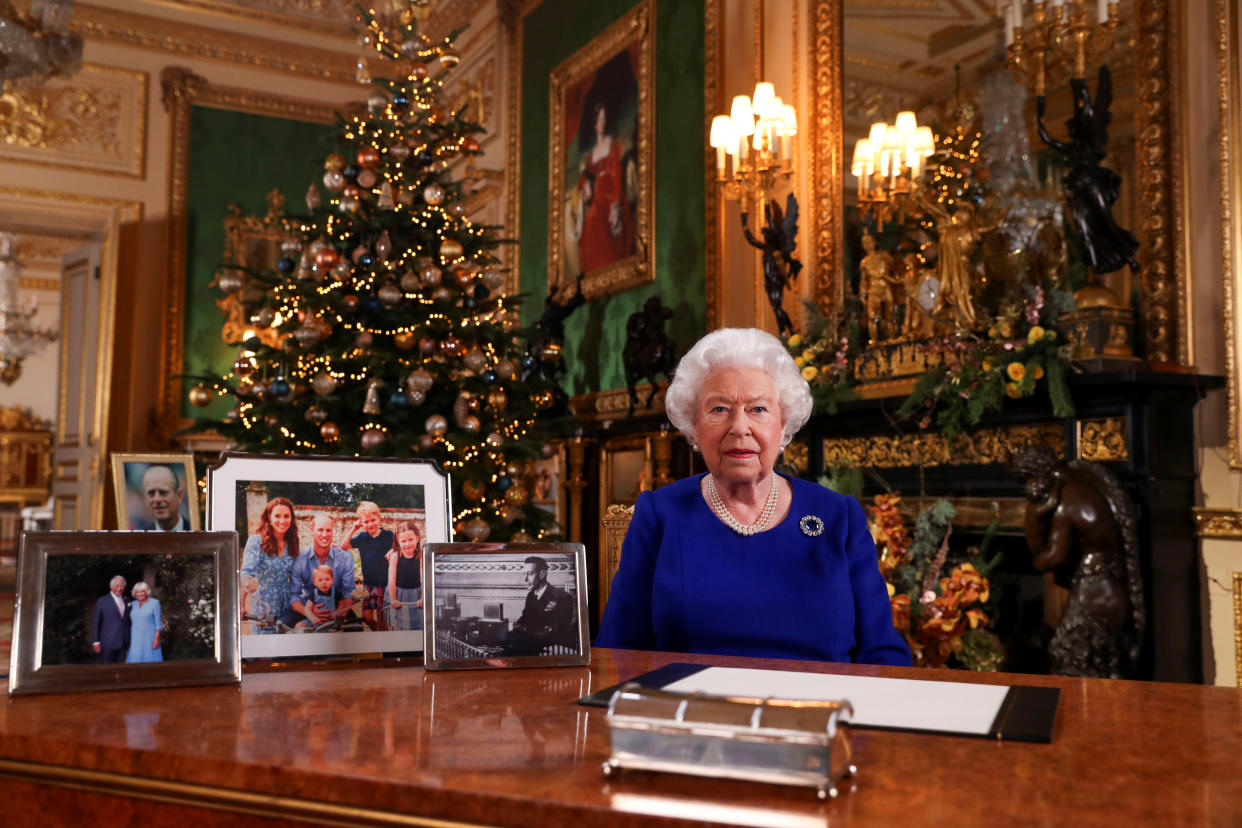 Britain's Queen Elizabeth poses, after recording her annual Christmas Day message in Windsor Castle, in Berkshire, Britain, in this undated pool picture released on December 24, 2019. Steve Parsons/Pool via REUTERS