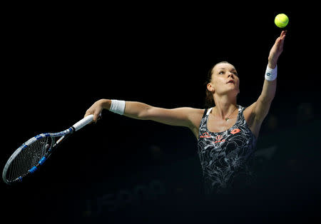 FILE PHOTO: Tennis - Singapore WTA Finals Round Robin Singles - Singapore Indoor Stadium, Singapore - 26/10/2016 - Agnieszka Radwanska of Poland in action against Garbine Muguruza of Spain. REUTERS/Edgar Su/File Photo