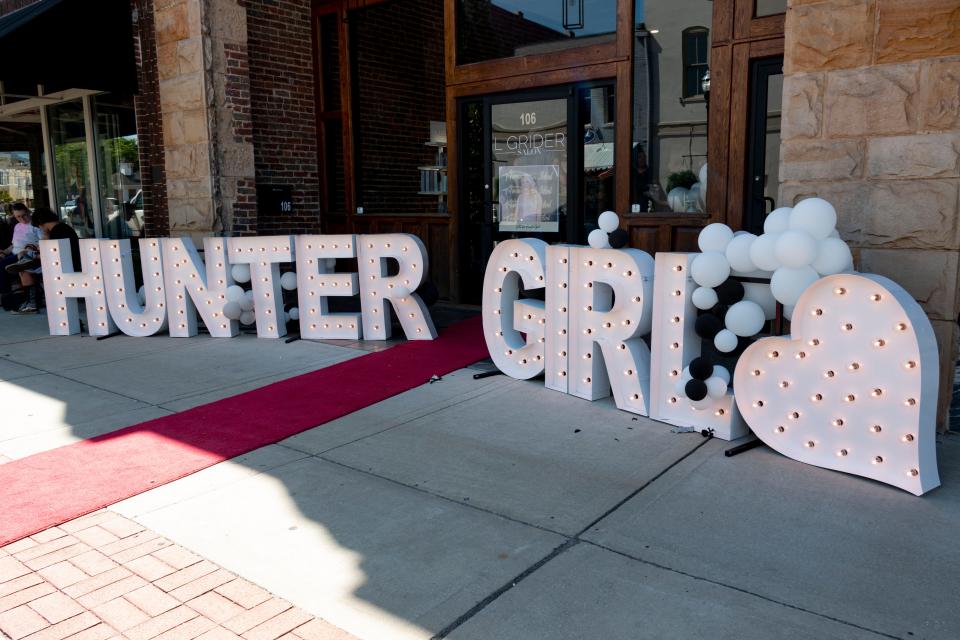 A red carpet and lit up letters became a perfect spot for selfies on Tuesday, May, 17, 2022, during the HunterGirl Homecoming held in Winchester.