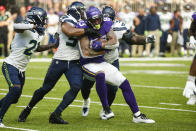 Minnesota Vikings tight end Tyler Conklin (83) is tackled by Seattle Seahawks middle linebacker Bobby Wagner (54) in the first half of an NFL football game in Minneapolis, Sunday, Sept. 26, 2021. (AP Photo/Bruce Kluckhohn)