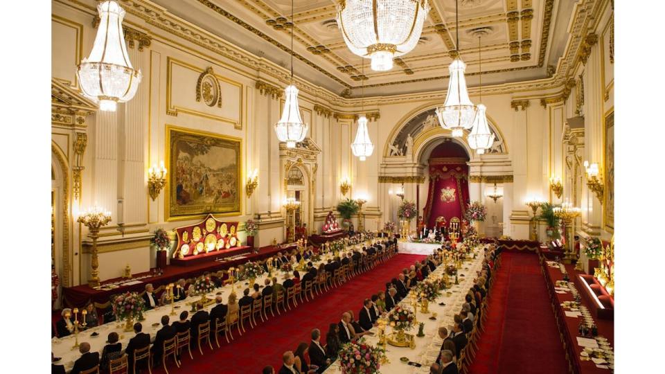 Guests sat inside the Ballroom inside Buckingham Palace