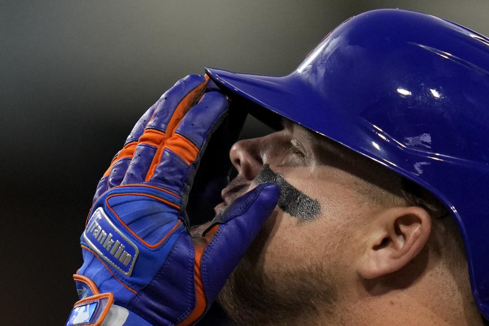 New York Mets' Daniel Vogelbach reacts after hitting an RBI-single during the fifth inning of a baseball game against the San Diego Padres, Friday, July 7, 2023, in San Diego. (AP Photo/Gregory Bull)