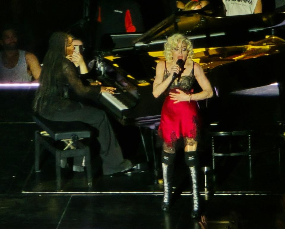 Madonna and daughter, Mercy James, perform at The Forum, in LA. Brian Prahl / SplashNews.com