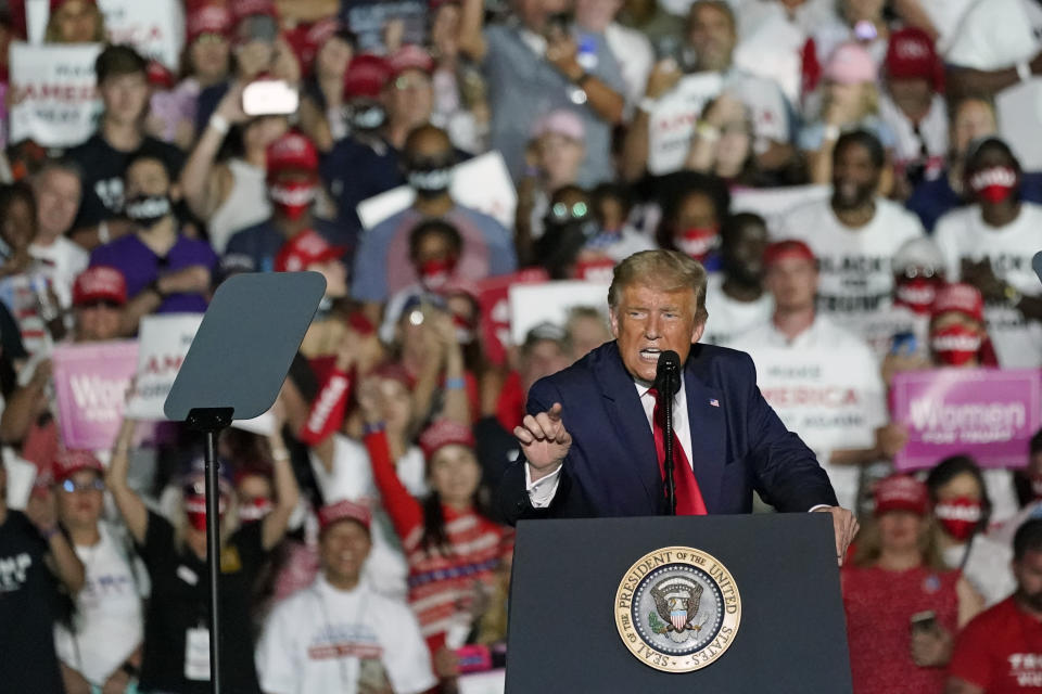 President Donald Trump speaks at campaign rally at the Orlando Sanford International Airport Monday, Oct. 12, 2020, in Sanford, Fla. (AP Photo/John Raoux)