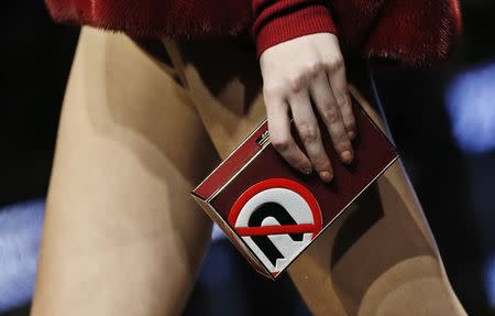 A model presents a creation from the Anya Hindmarch Autumn/Winter 2015 collection during London Fashion Week February 24, 2015. REUTERS/Suzanne Plunkett