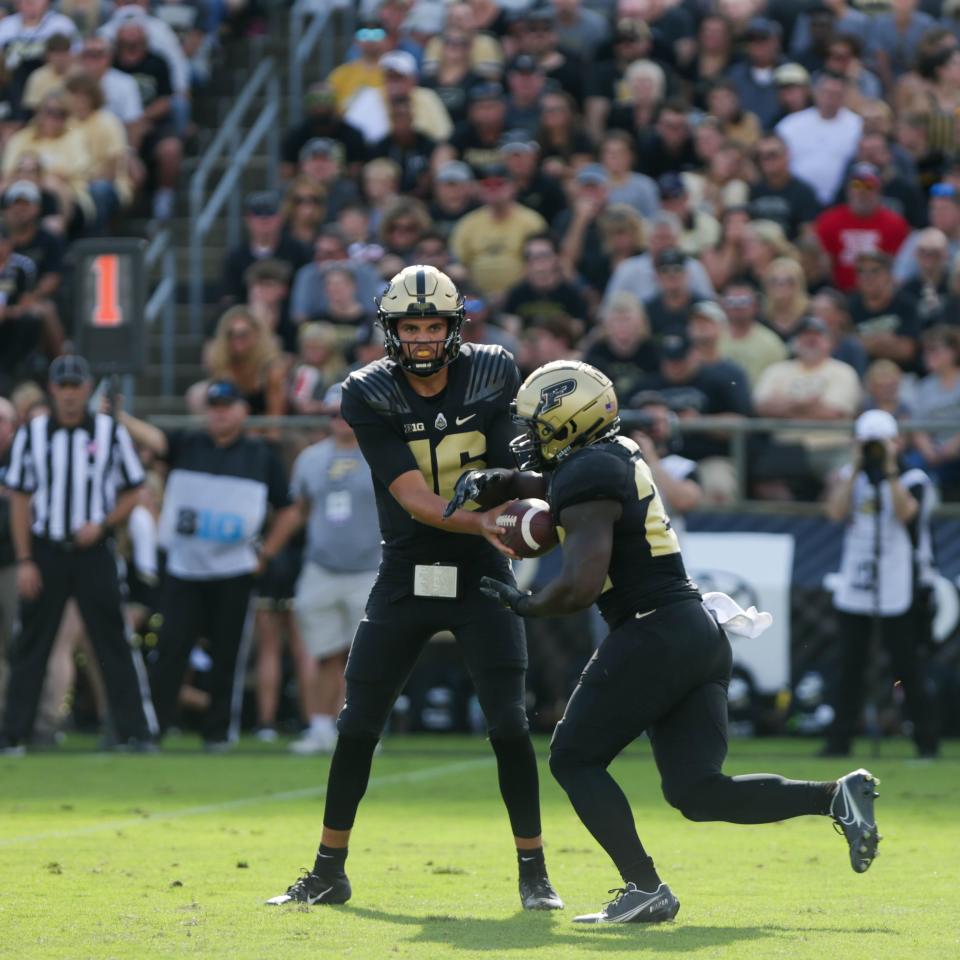 Purdue Boilermakers quarterback Aidan O'Connell (16) hands off to running back King Doerue (22) during the NCAA football game against Indiana State Sycamores, Saturday, Sept. 10, 2022, at Ross-Ade Stadium in West Lafayette, Ind.