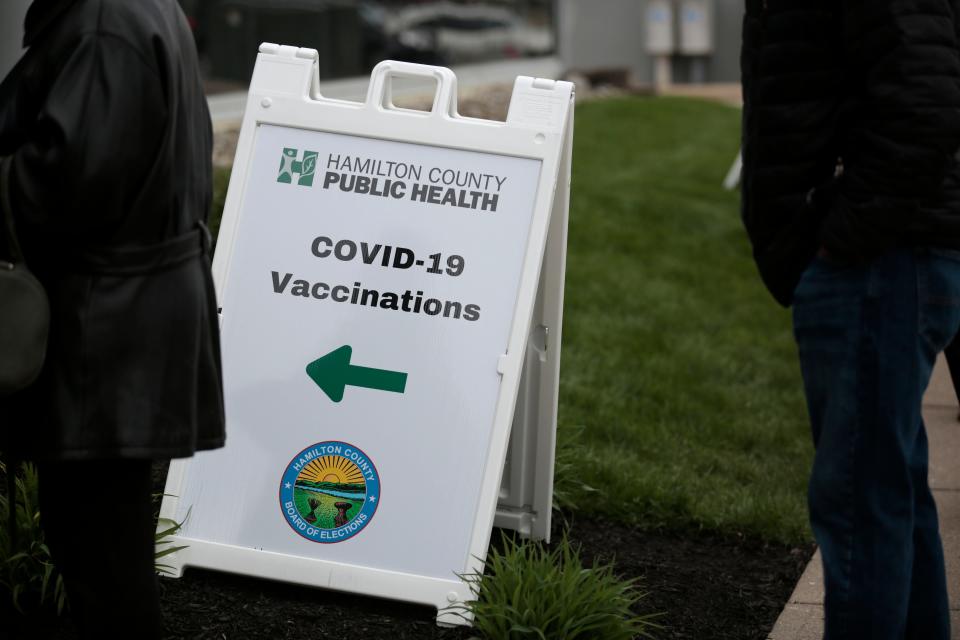 Community members arrive and register during a walk-up vaccine event at the Hamilton County Board of Elections in Norwood, Ohio, on Thursday, April 15, 2021. 