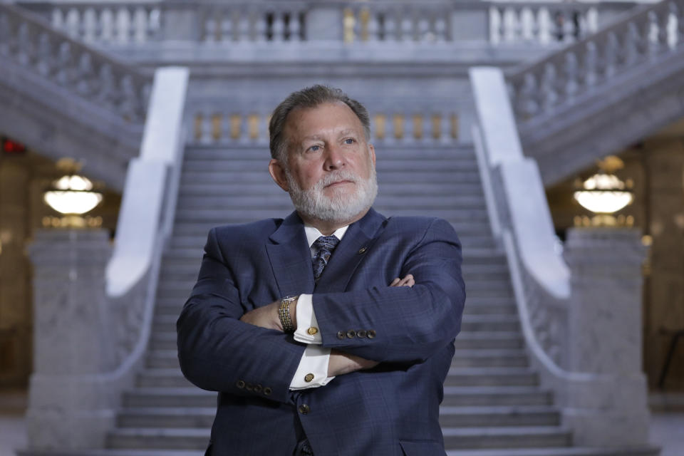 FILE - In this Feb. 19, 2020, file photo, Republican Sen. Curt Bramble poses for a portrait at the Utah State Capitol, in Salt Lake City. All six women in the Utah Senate walked out in protest and refused to vote Tuesday, March 10, 2020, on a bill mandating a woman be shown an ultrasound before receiving an abortion. The bill passed despite their absence. Bramble, who is sponsoring the bill in the Senate, said a woman could look away from the images, or not listen to the heartbeat. "If you are going to take the life of a child, if you are willing to terminate that life through an abortion, it seems appropriate that you get the best information about the development, the stage of development, heart beat we are talking about a human being," Bramble told the Deseret News. (AP Photo/Rick Bowmer, File)