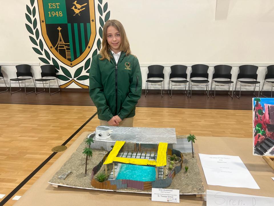 A student from St. Theresa Catholic School showcases her model for the 10th anniversary St. Theresa School Modernism Projects exhibit on Tuesday, Feb. 20, 2024 in Palm Springs, Calif.