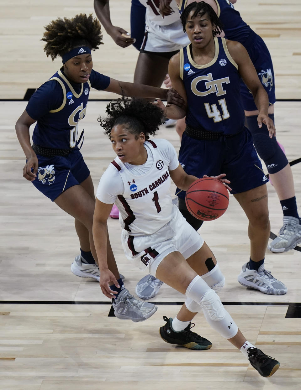 South Carolina guard Zia Cooke (1) drives around Georgia Tech guard Kierra Fletcher (41) during the first half of a college basketball game in the Sweet Sixteen round of the women's NCAA tournament at the Alamodome in San Antonio, Sunday, March 28, 2021. (AP Photo/Eric Gay)