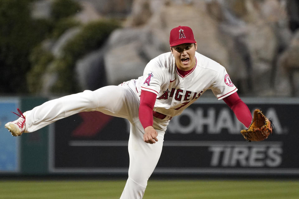 Los Angeles Angels starting pitcher Shohei Ohtani throws to the plate during the fifth inning of a baseball game against the Boston Red Sox Thursday, June 9, 2022, in Anaheim, Calif. (AP Photo/Mark J. Terrill)