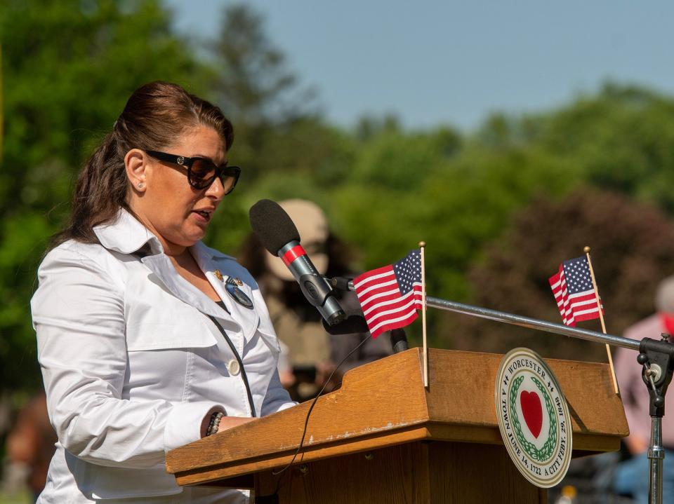 Gold Star Mother Tracy Racine speaks during the city’s Memorial Day ceremony in Hope Cemetery Monday. Her son Pfc. Brian M. Moquin Jr. was killed in action in Afghanistan in 2006 while serving in the U.S. Army 10th Mountain Division.