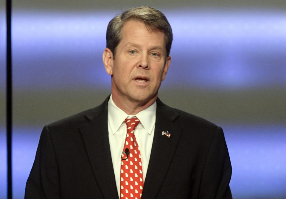 FILE - In this May 20, 2018, file photo, Georgia Republican gubernatorial candidate Brian Kemp participates in a debate in Atlanta. Former President Jimmy Carter is wading into the final days of a Georgia governor's race that's rife with charges and countercharges of attempted voter fraud and attempted voter suppression. In a letter Carter asked Republican nominee Kemp to resign from his post as Georgia secretary of state. Kemp is locked in a tight race with Democrat Stacey Abrams, whom Carter has endorsed. (AP Photo/John Amis, File)