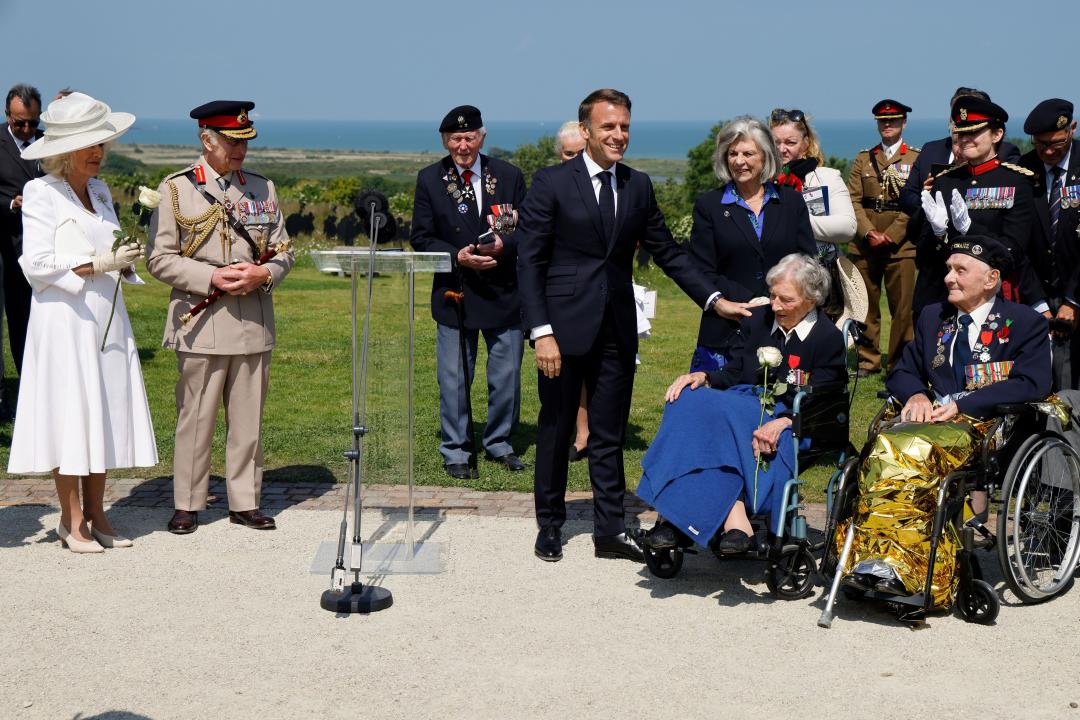 The King, Queen and Emmanuel Macron with 104-year-old British World War II veteran Christian Lamb. (PA)