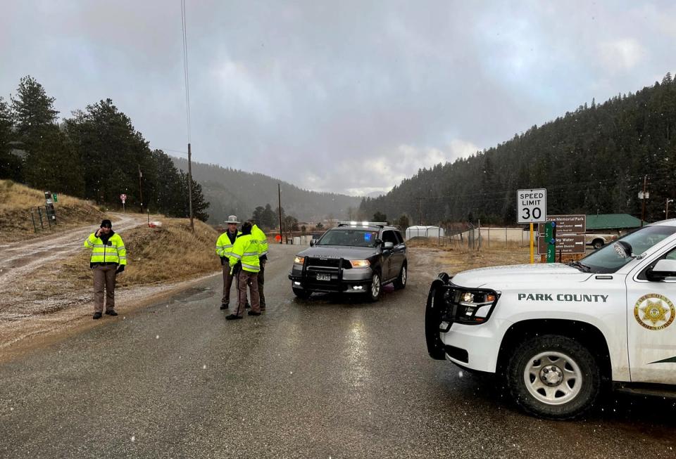 Sheriff deputies block a road in the town of Colorado where authorities found an abandoned car (Copyright 2023 The Associated Press. All rights reserved.)