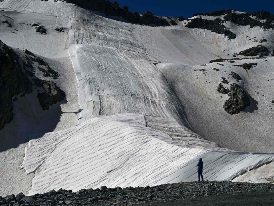 glacier melt tarps italy alps snow protection presena