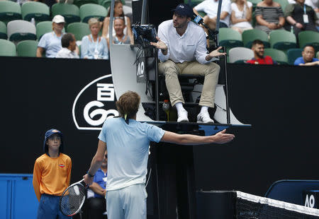 Tennis - Australian Open - Rod Laver Arena, Melbourne, Australia, January 20, 2018. Alexander Zverev of Germany speaks to umpire Ignacio Forcadell during his match against Chung Hyeon of South Korea. REUTERS/Thomas Peter