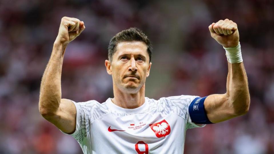 Robert Lewandowski celebrating goal for Poland