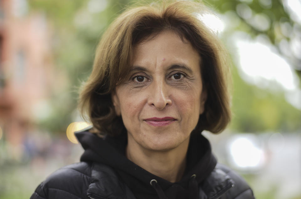 Canan Bayram a German-Kurdish lawyer who was elected to the Bundestag in 2017 for the Green party and run for a second term at the upcoming elections, pose for a photo in Berlin, Germany, Tuesday, Sept. 21, 2021. Hundreds of immigrants are running in Germany's national election on Sunday, raising the possibility of making its next parliament more diverse than ever. While it still might not fully represent the country's overall diversity, where more than a quarter of the population has immigrant roots, it's a step toward a more accurate reflection of society. (AP Photo/Markus Schreiber)