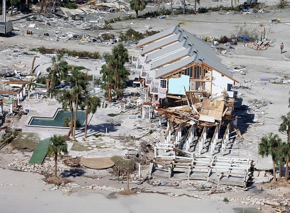 FORT MYERS BEACH,FLORIDA - SEPTEMBER 29: In an aerial view, damaged buildings are seen as Hurricane Ian passed through the area on September 29, 2022 in Fort Myers Beach, Florida. The hurricane brought high winds, storm surge and rain to the area causing severe damage. (Photo by Joe Raedle/Getty Images)