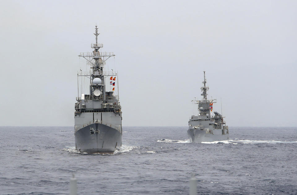 A KIDD-class destroyer, left, and a Knox-class frigate are seen during a navy exercise off Hualien County, east of Taiwan, Wednesday, May 22, 2019. (AP Photo/Chiang Ying-ying)