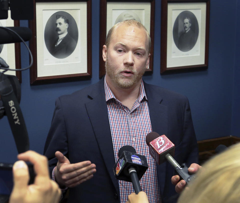 Wil Lawrence, chief of staff for Senate Minority Leader Anthony Hensley, D-Topeka, who attended the Greg Orman delivery of signatures, Monday, Aug. 6, 2018, said the Orman petition signatures would be closely vetted. Orman has submitted petitions with more than 10,000 signatures to get on the November ballot as an independent candidate for Kansas governor. (Thad Allton/The Topeka Capital-Journal via AP)